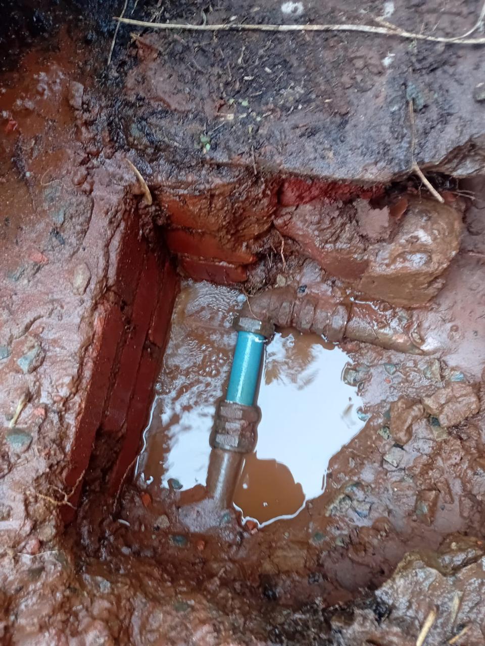 Underground water pipe exposed for repair